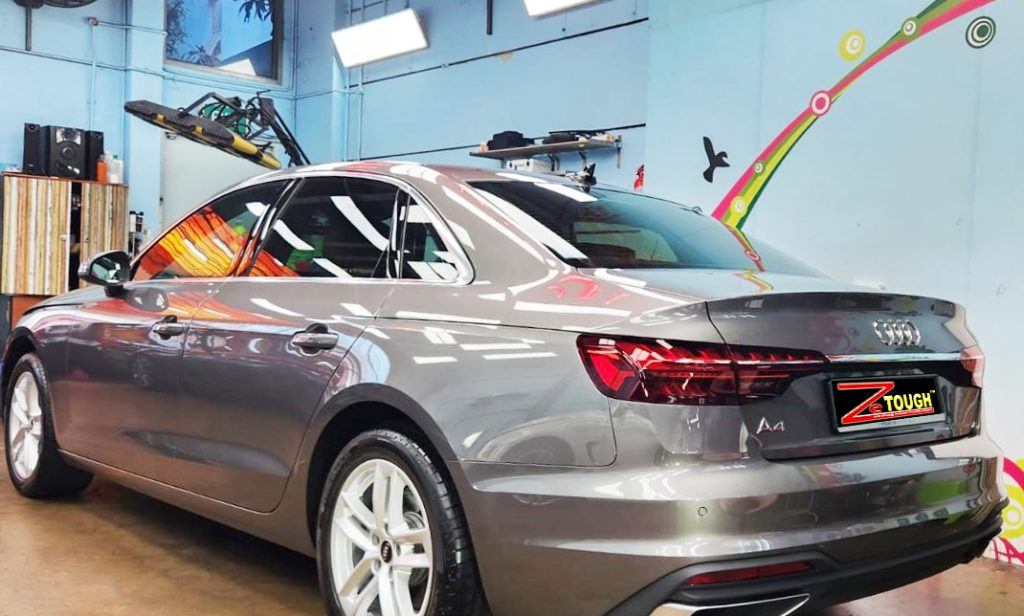 Rear quarter of the Audi A4, glossy and protected.