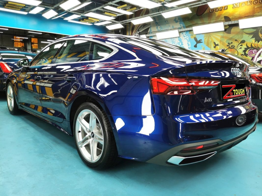 Rear quarter of the Audi A5, glossy and protected.