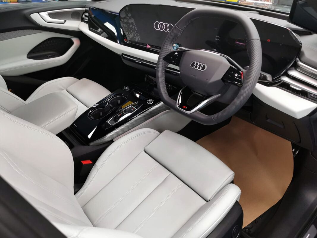 The Audi A5 parked in the workshop, freshly coated.