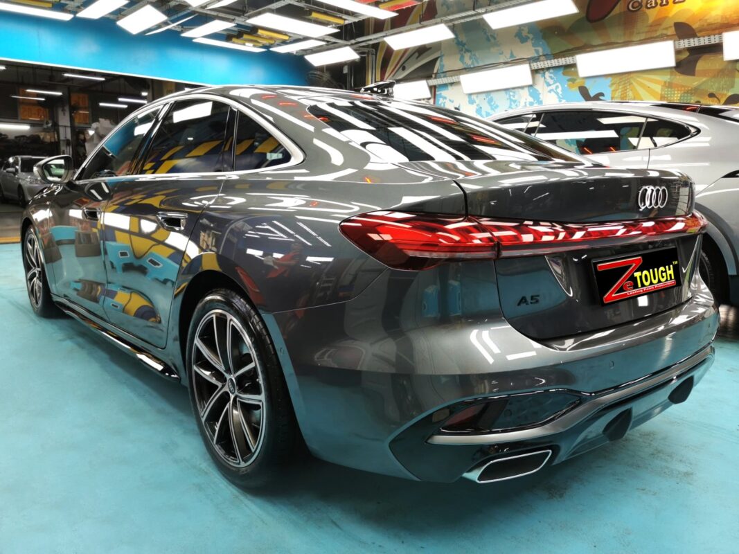 Rear quarter of the Audi A5, glossy and protected.