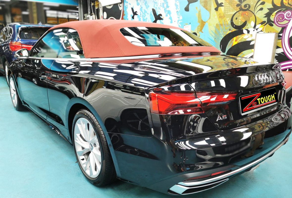 Rear quarter of the Audi A5 Cabrio, glossy and protected.