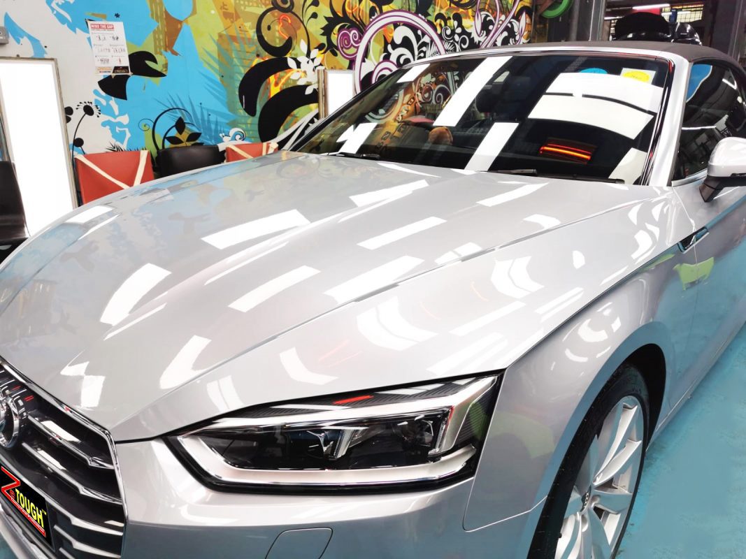 The Audi A5 Cabriolet from a side angle after the titanium coating.