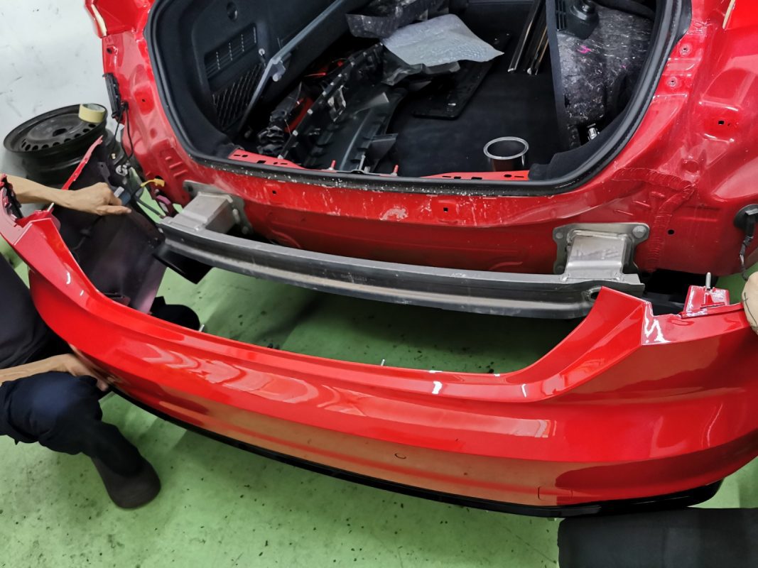 Polishing the new paint on the A5 to bring up the shine.