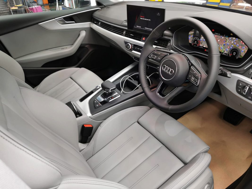 The Audi A5 parked in the workshop, freshly coated.