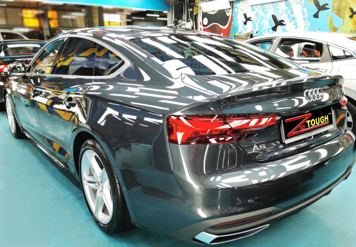 Rear quarter of the Audi A5, glossy and protected.