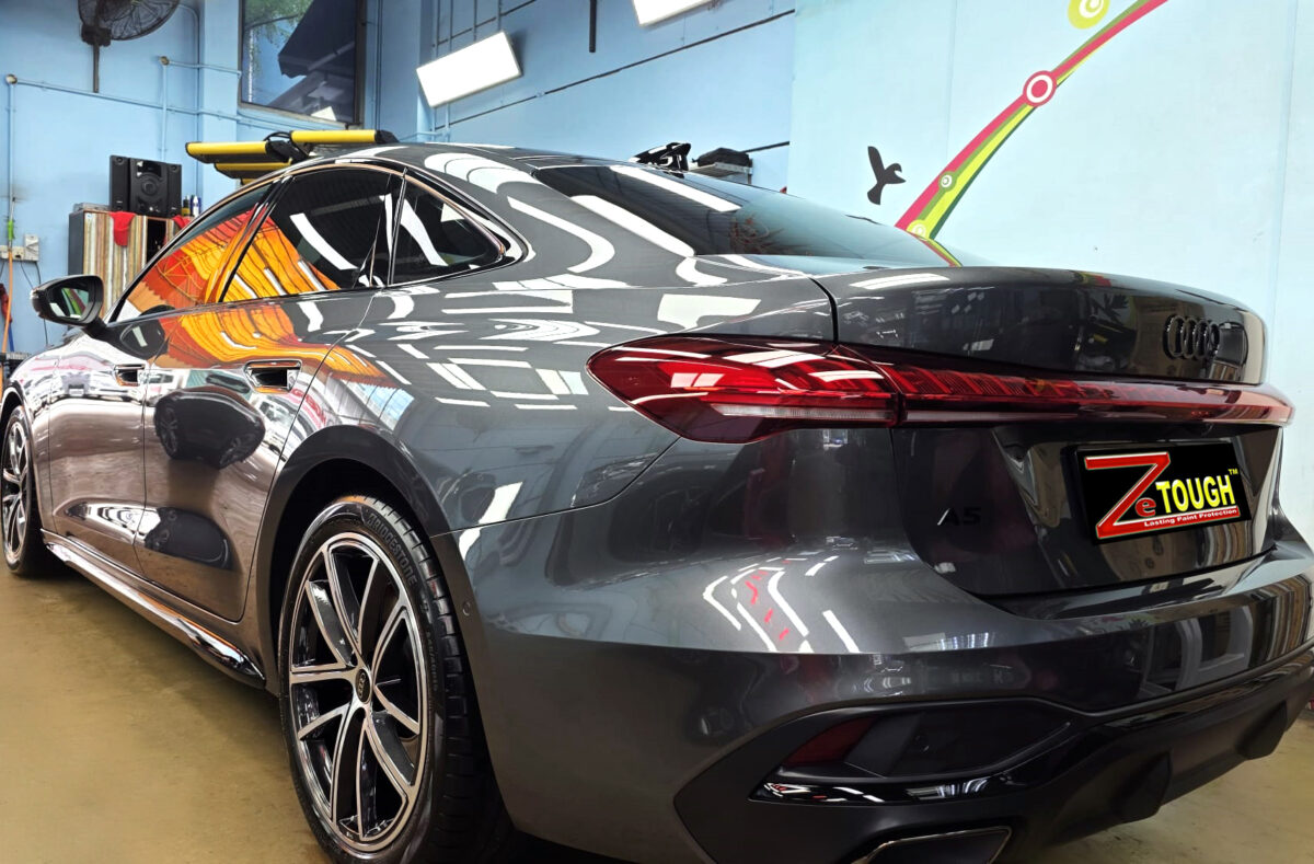 Rear quarter of the Audi A5, glossy and protected.