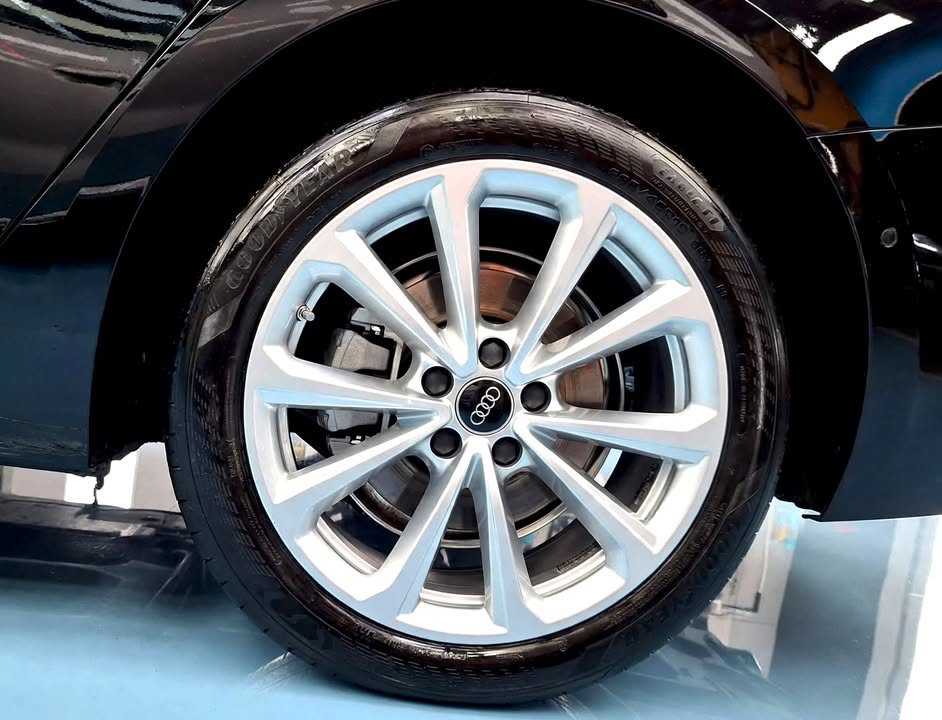 Close-up of the silver multi-spoke Audi alloy wheel.