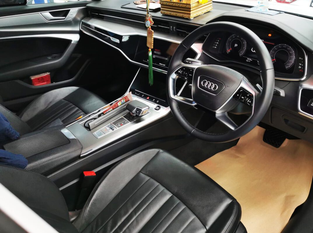 The Audi A6 parked in the workshop, freshly coated.