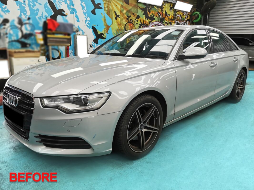 Audi A6 sedan, glossy after its full body respray.