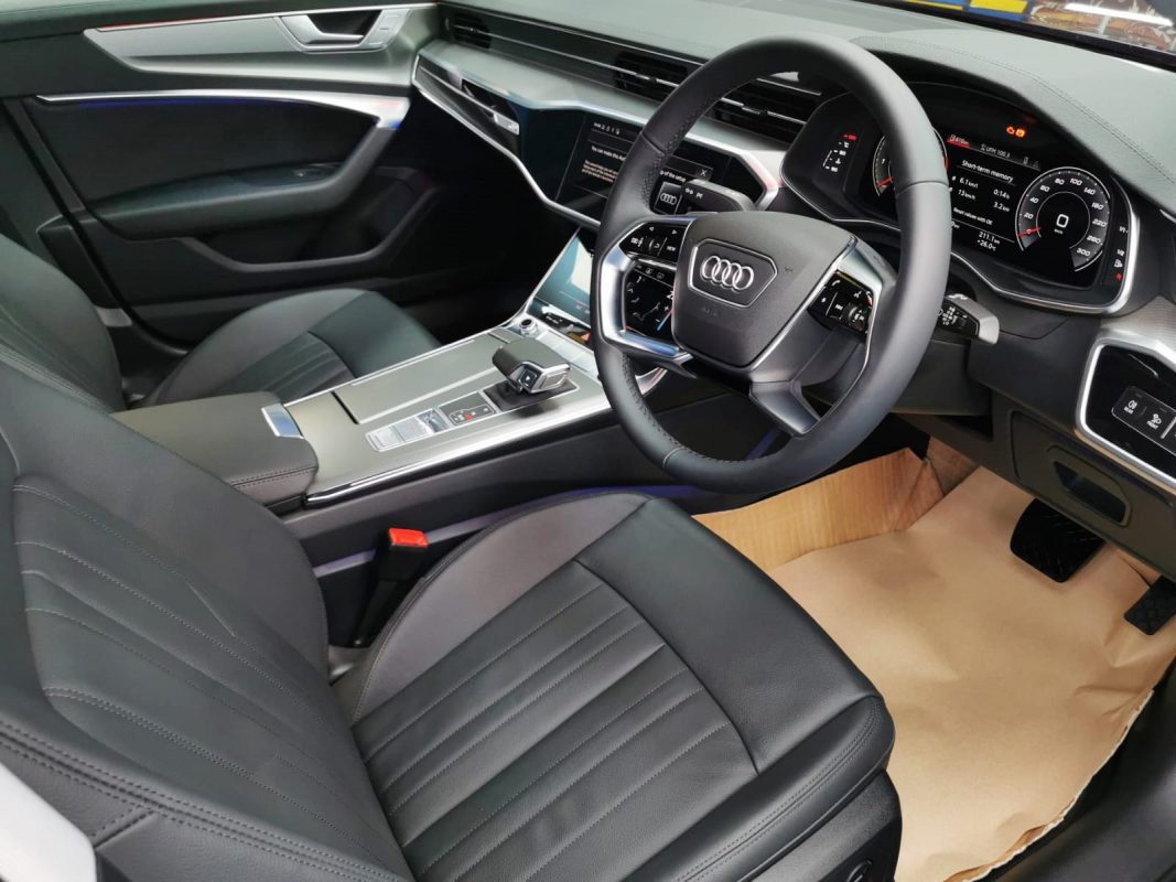 The Audi A6 parked in the workshop, freshly coated.