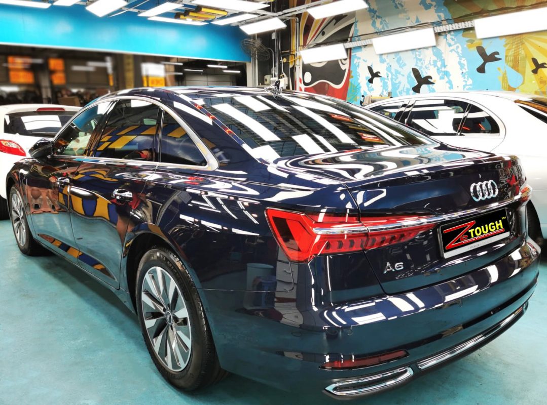 Rear quarter of the Audi A6, glossy and protected.