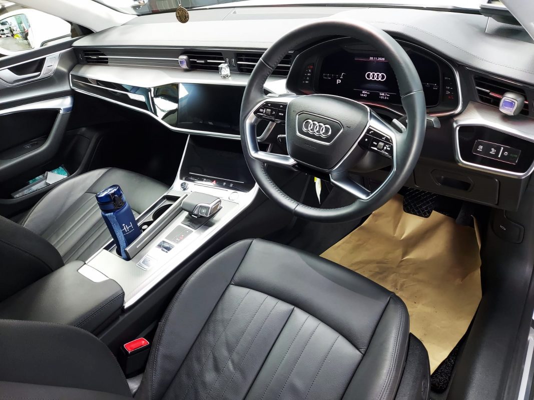 The Audi A7 parked in the workshop, freshly coated.