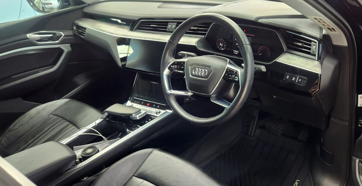 The Audi e-tron parked in the workshop, freshly coated.