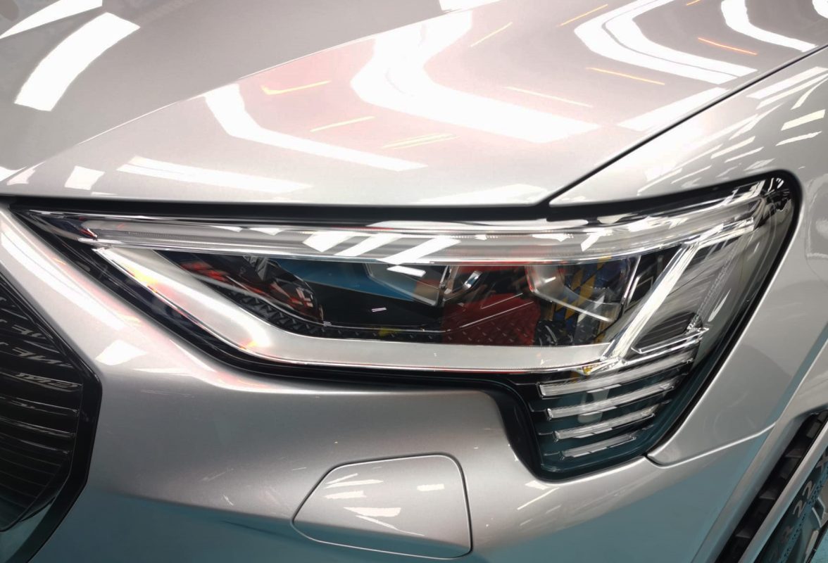 The e-tron's coated paintwork showing clean reflections.