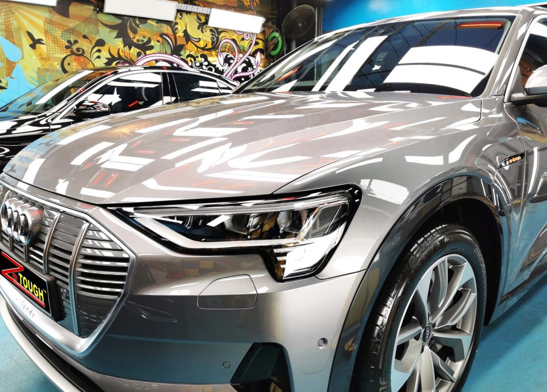 The Audi e-tron from a side angle after the titanium coating.