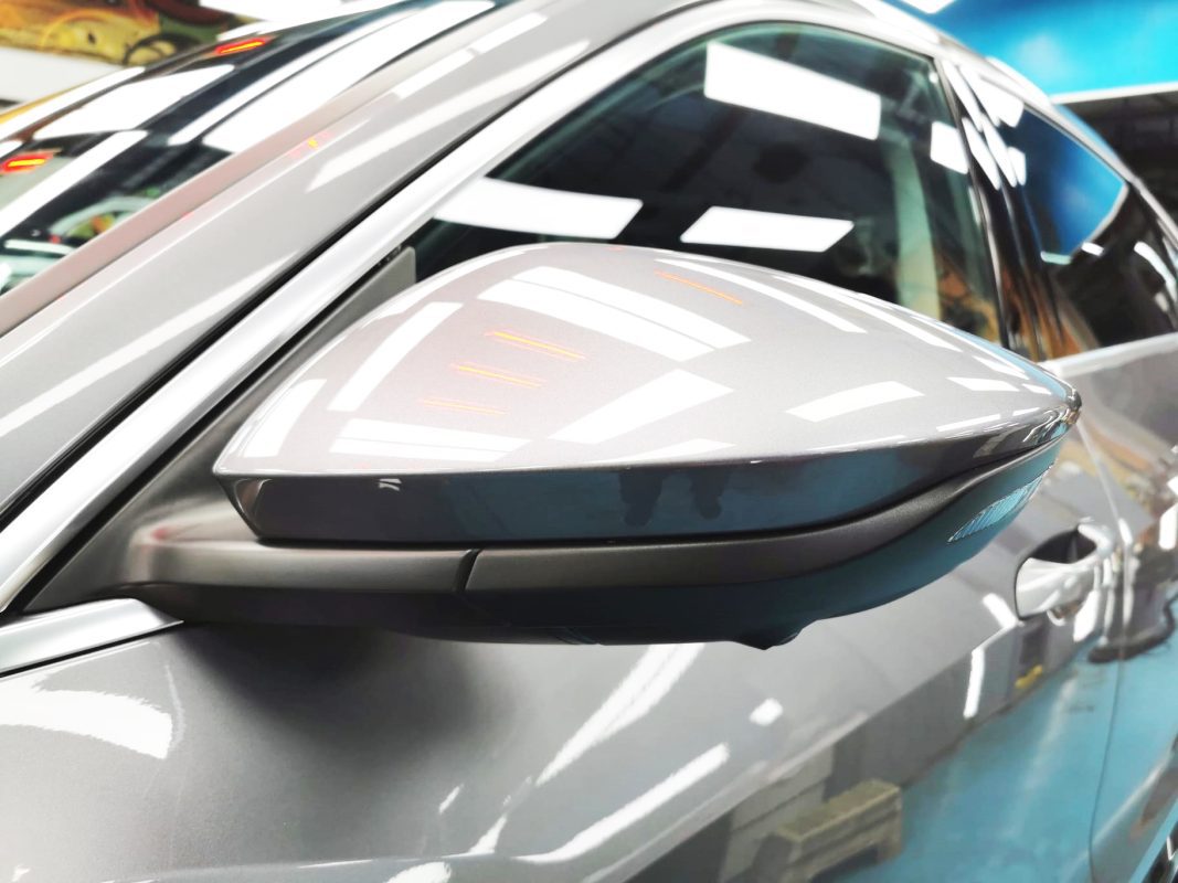 Side panel of the Audi e-tron with the titanium finish locked in.