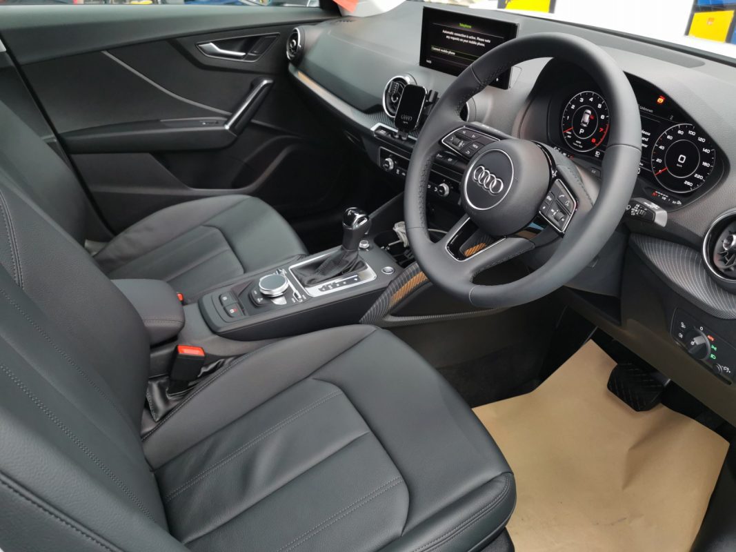 The Audi Q2 parked in the workshop, freshly coated.