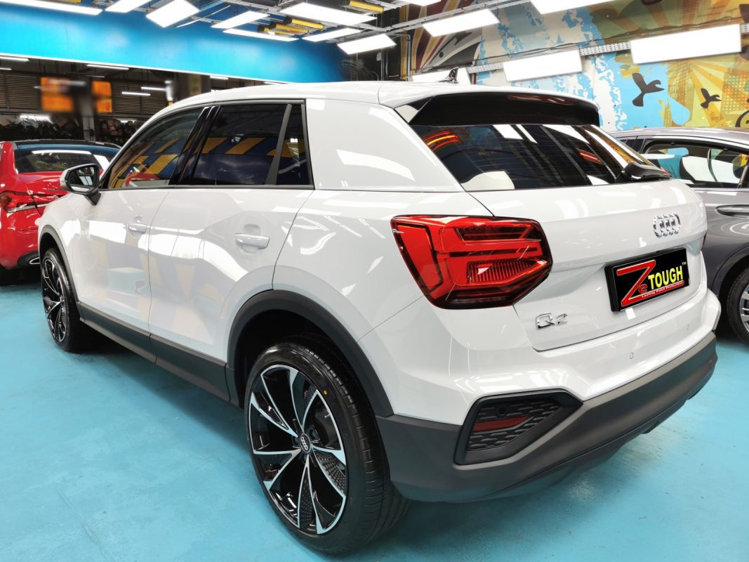 Rear quarter of the Audi Q2, glossy and protected.