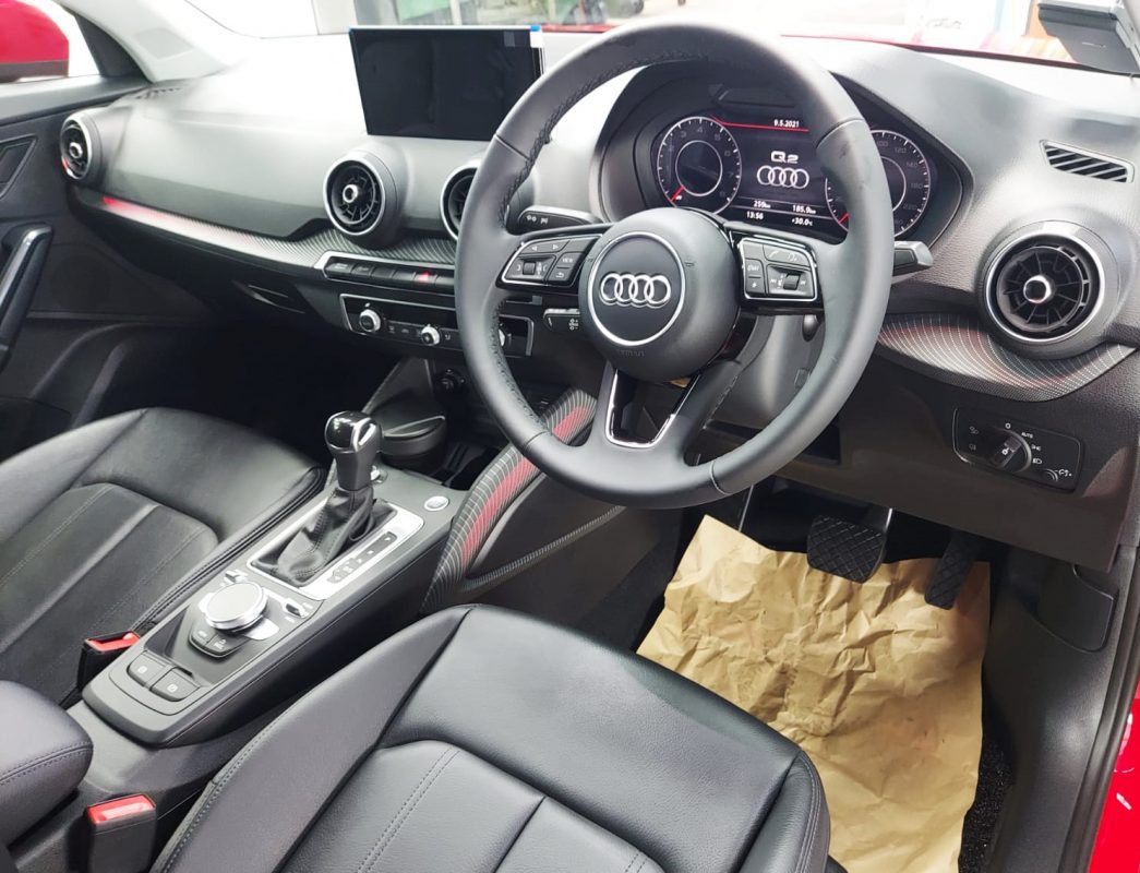 The Audi Q2 parked in the workshop, freshly coated.