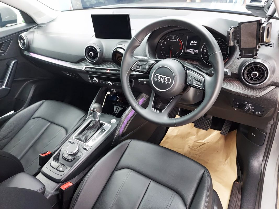 The Audi Q2 parked in the workshop, freshly coated.