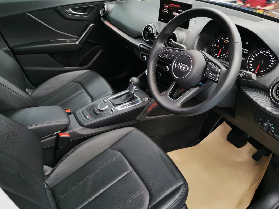 The Audi Q2 parked in the workshop, freshly coated.