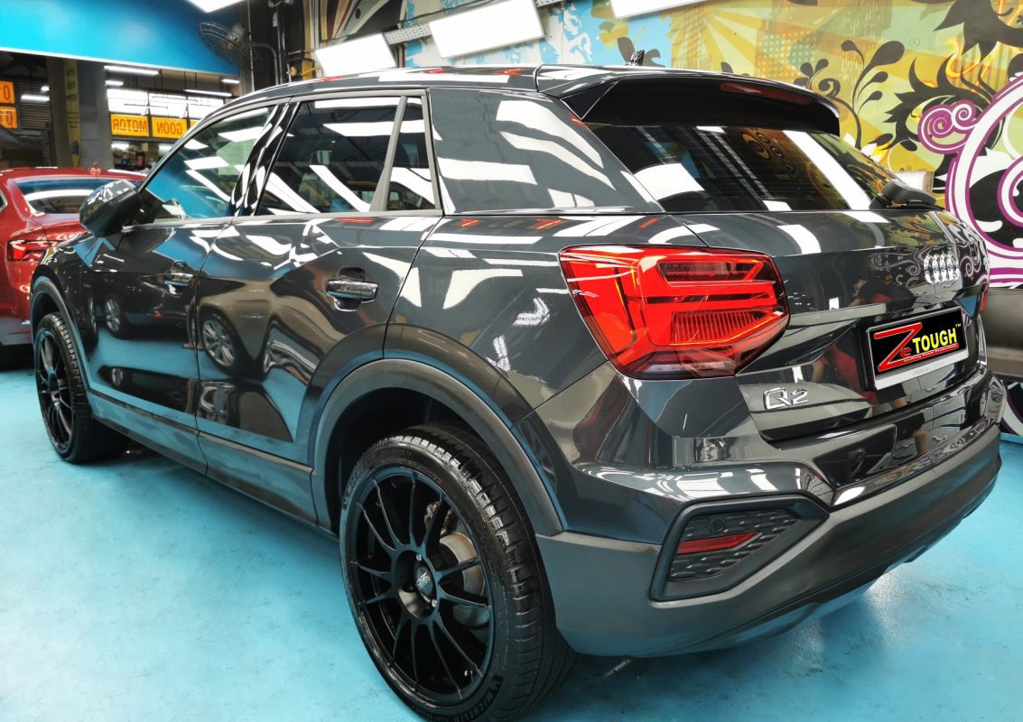 Rear quarter of the Audi Q2, glossy and protected.
