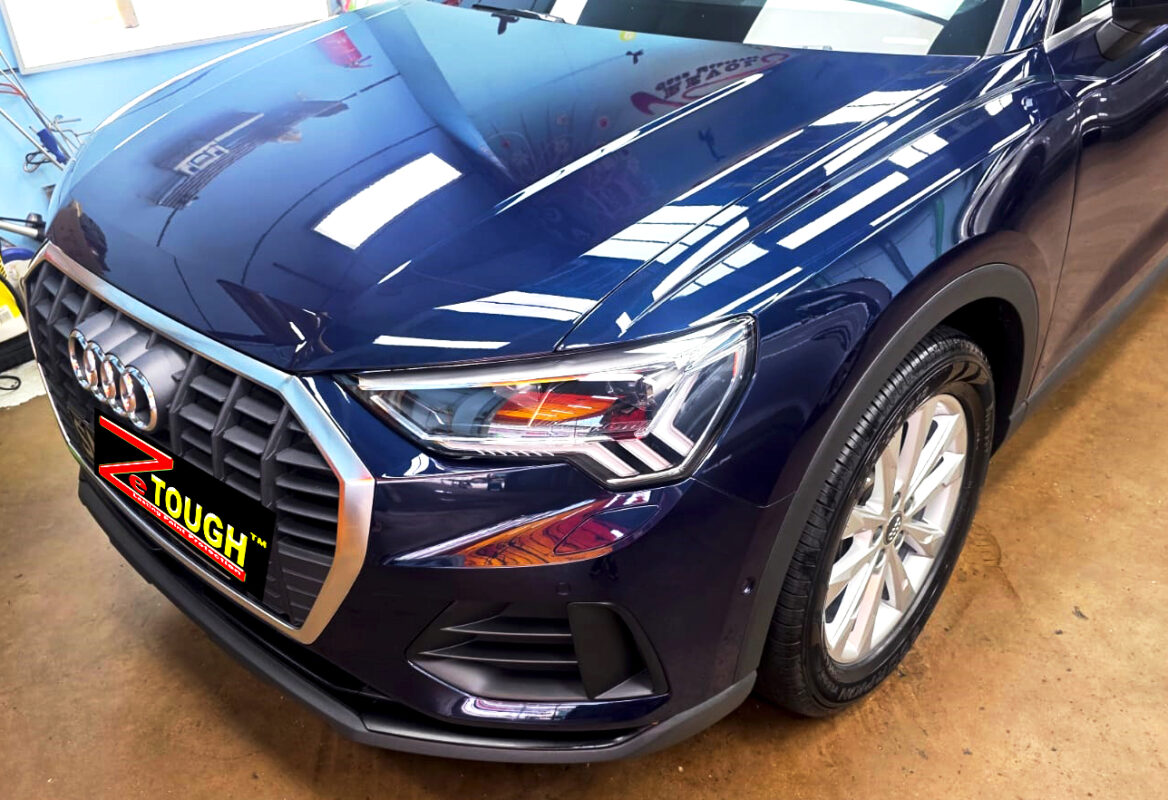 The Audi Q3 from a side angle after the titanium coating.