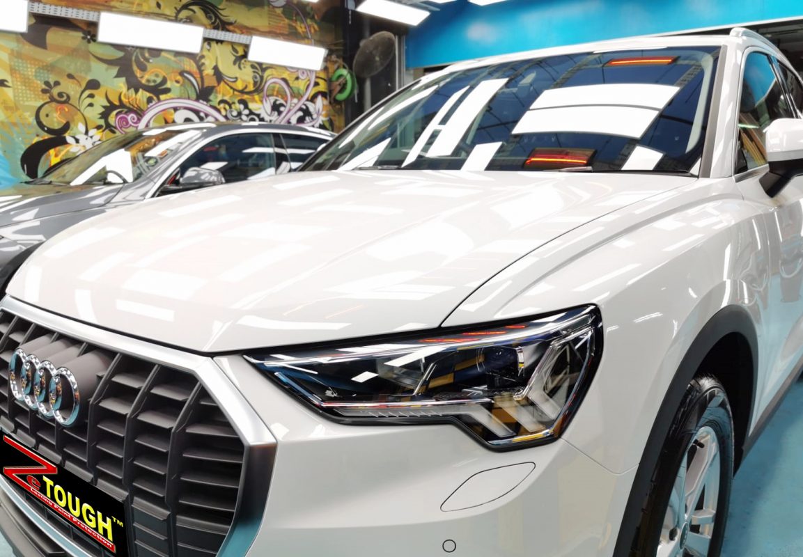 The Audi Q3 from a side angle after the titanium coating.