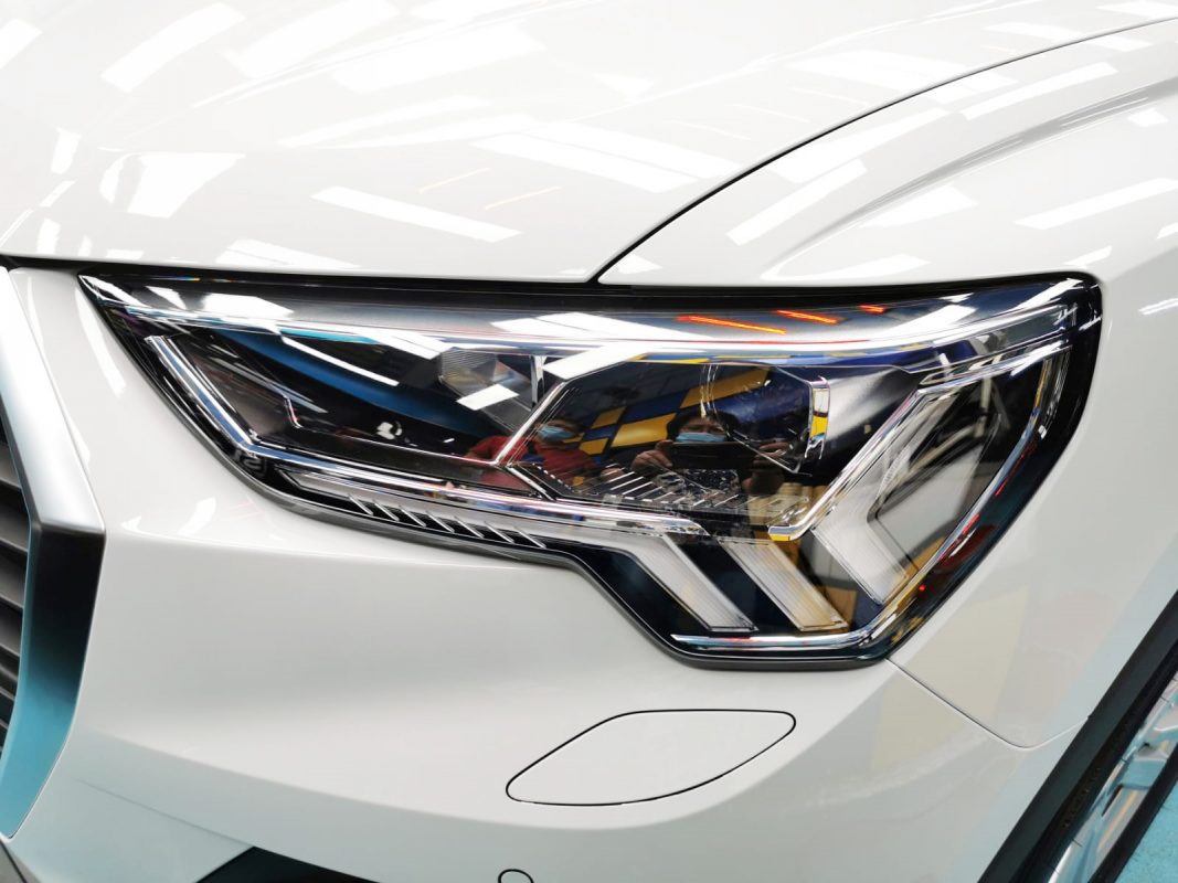 The Q3's coated paintwork showing clean reflections.