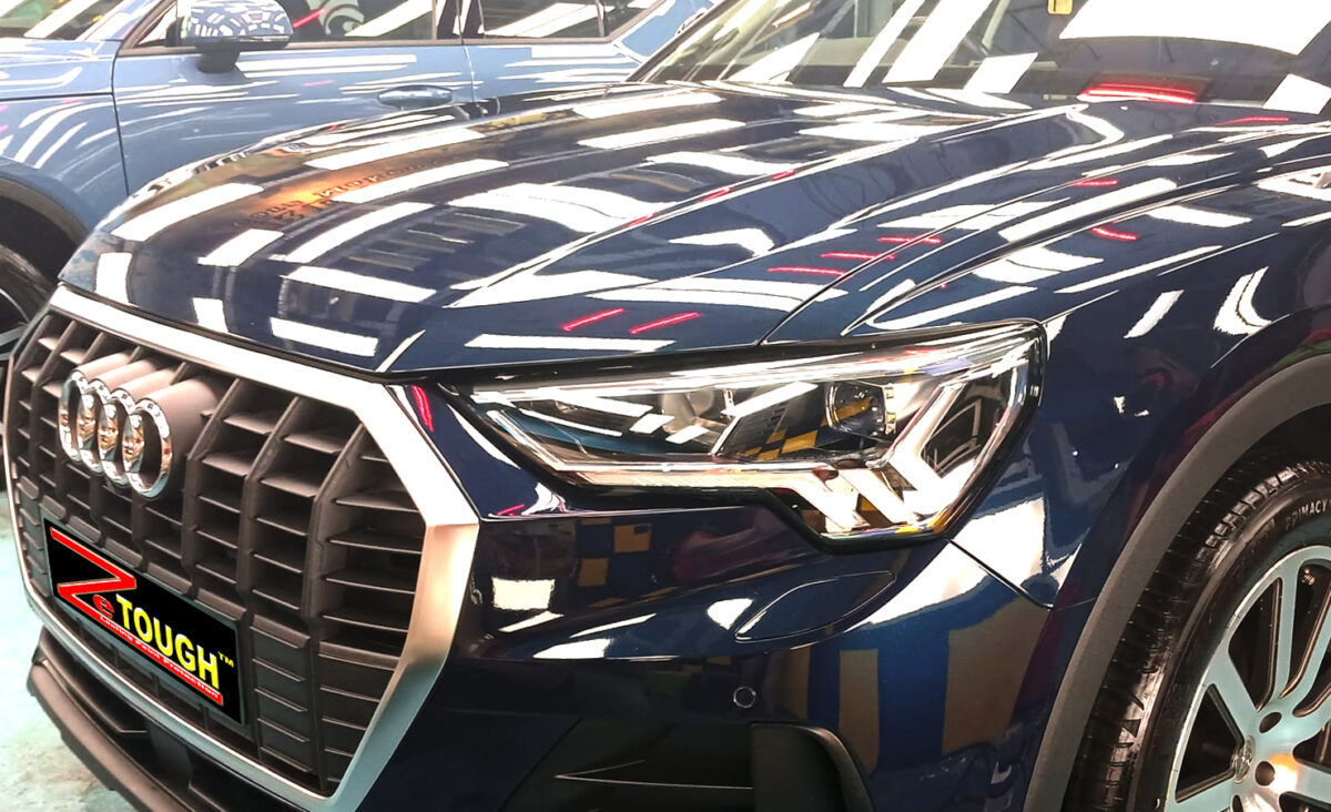 The Audi Q3 from a side angle after the ceramic coating.