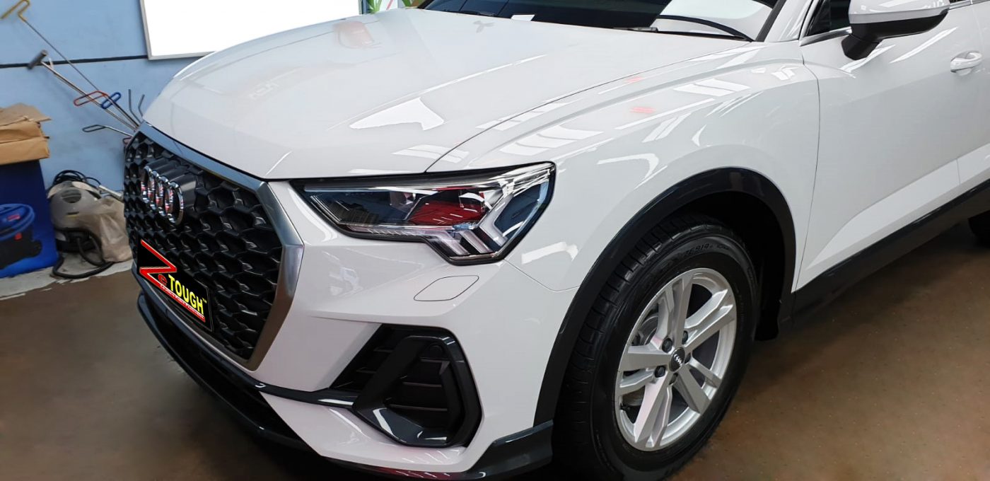 The Audi Q3 from a side angle after the titanium coating.