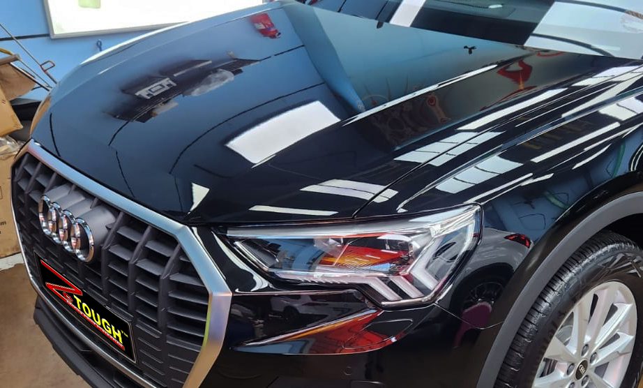The Audi Q3 from a side angle after the titanium coating.