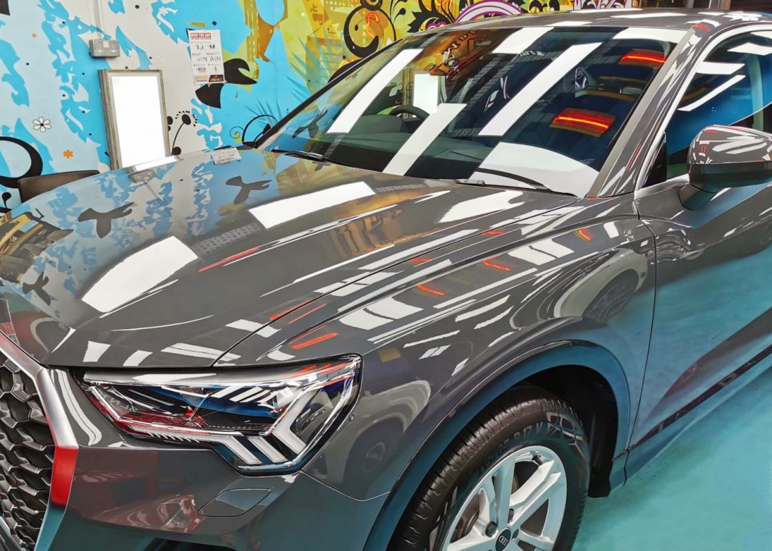 The Audi Q3 Sportback from a side angle after the titanium coating.