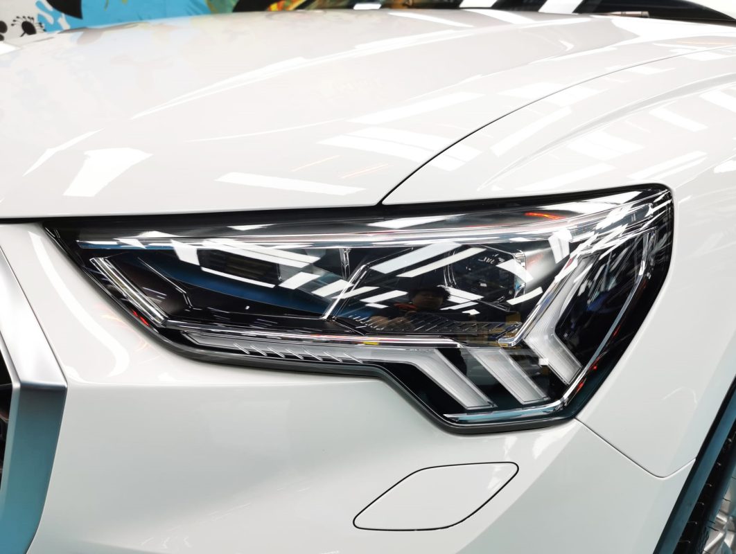 The Q3's coated paintwork showing clean reflections.