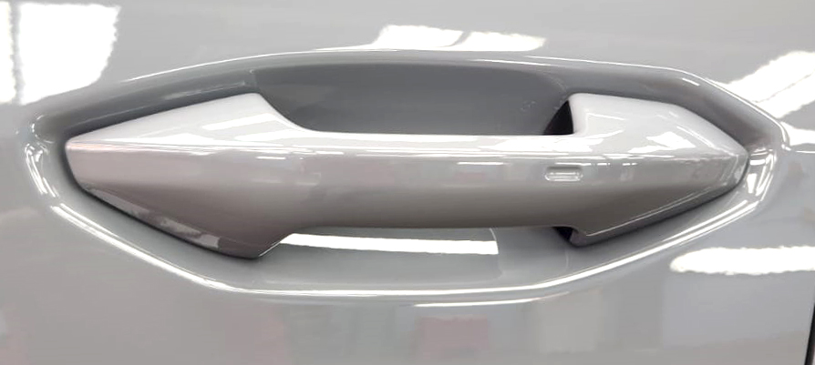 Front three-quarter view of the Audi Q4 after coating.