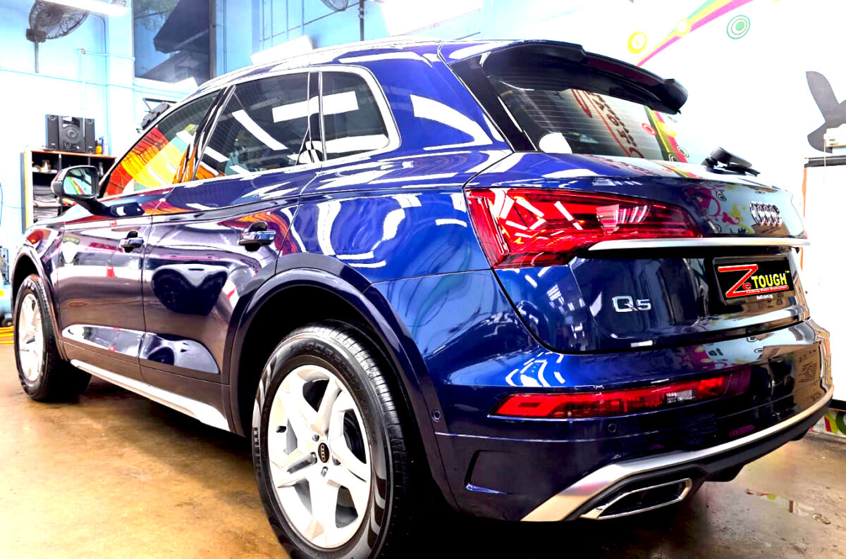 Rear quarter of the Audi Q5, glossy and protected.