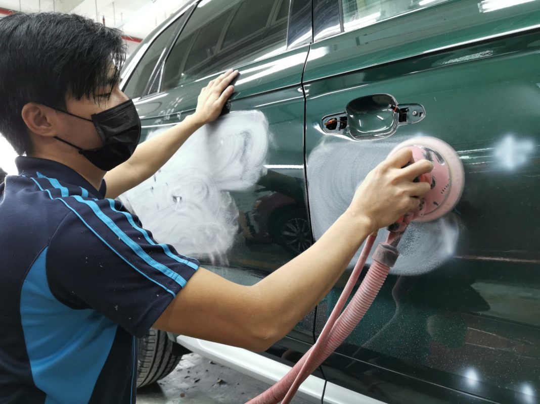 The Audi Q5 at an early stage of the job, with the body being inspected.