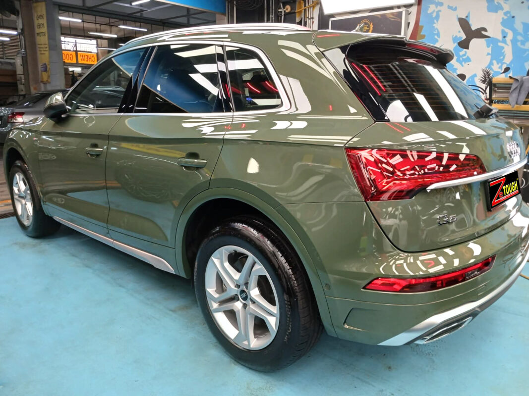 Rear quarter of the Audi Q5, glossy and protected.