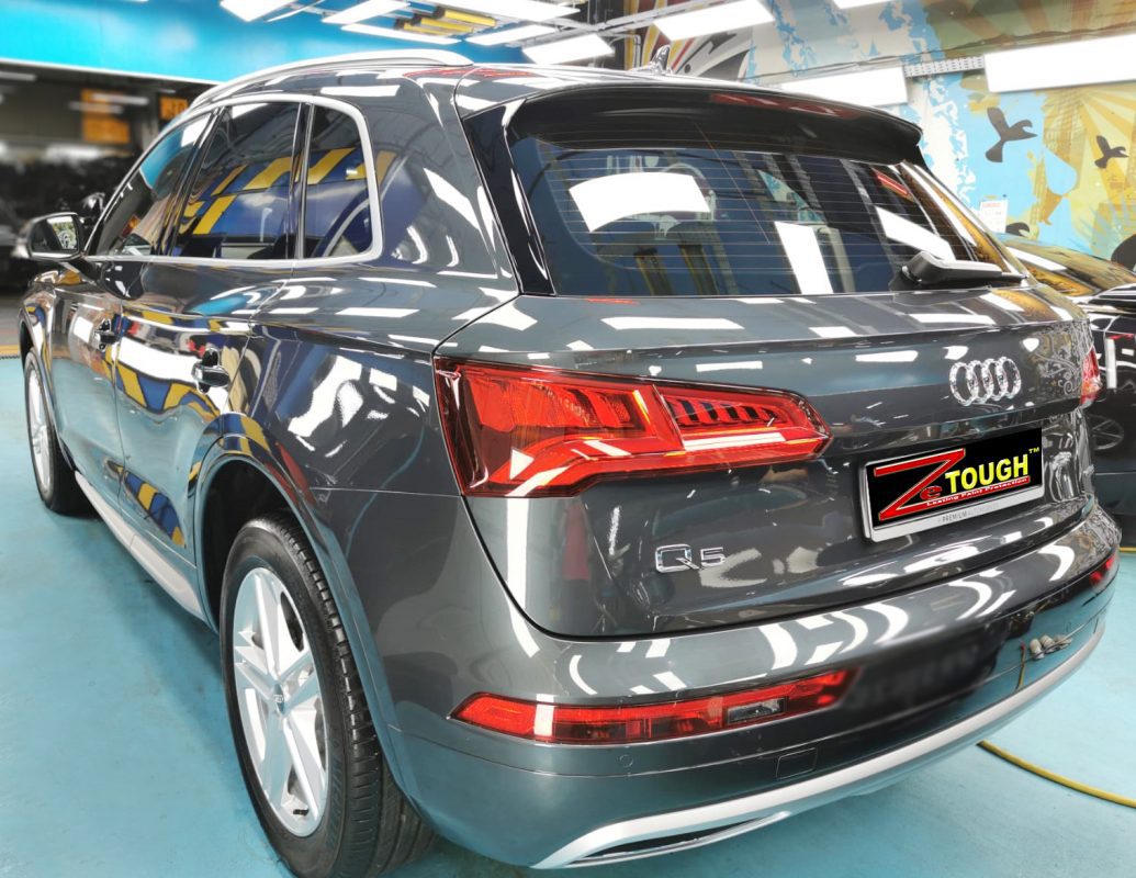 Rear quarter of the Audi Q5, glossy and protected.