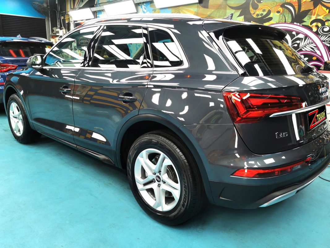 Rear three-quarter view of the coated Q5.