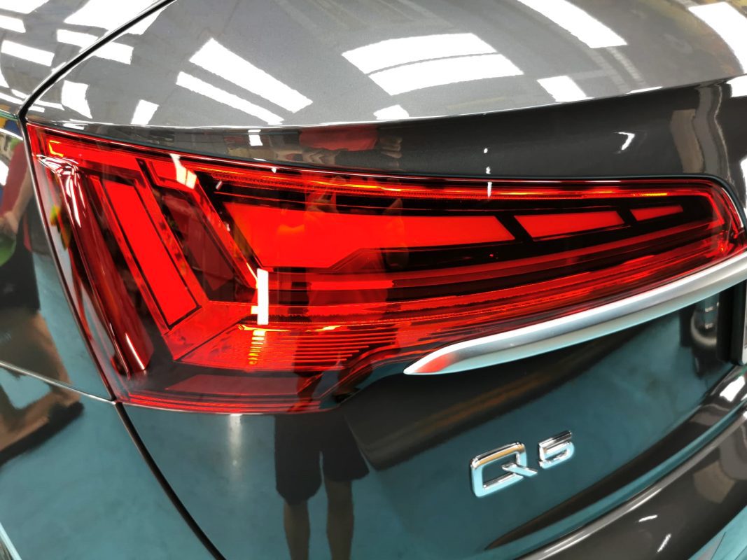 The bonnet of the Q5 under workshop lighting.