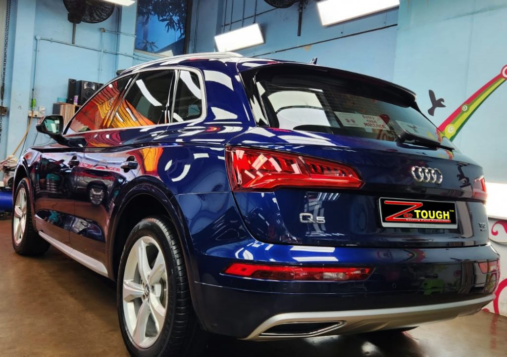 Rear quarter of the Audi Q5, glossy and protected.
