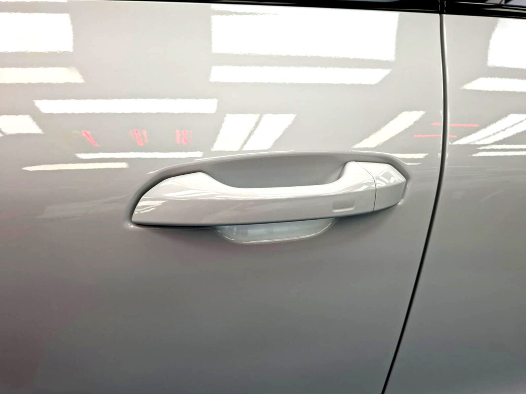 The coated paintwork of the Audi Q6 e-tron, clean and sharp.