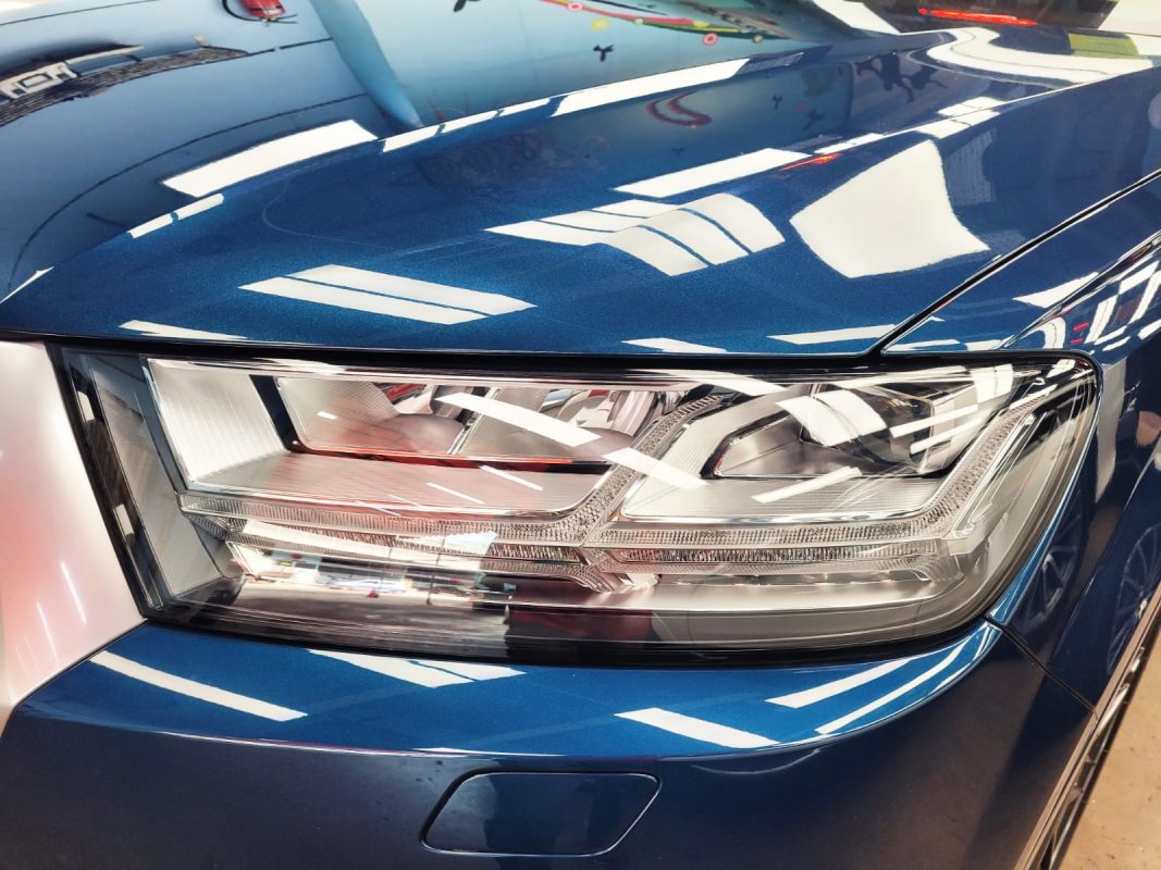 The Q7's coated paintwork showing clean reflections.