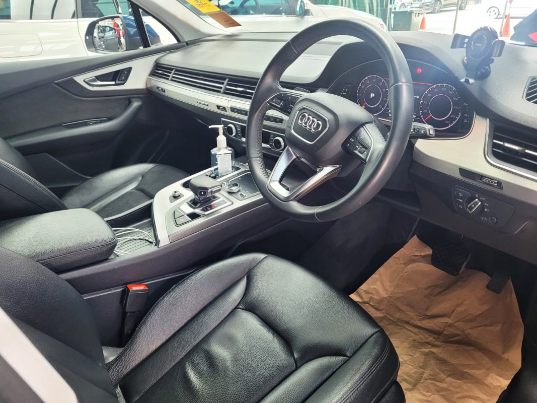 The Audi Q7 parked in the workshop, freshly coated.