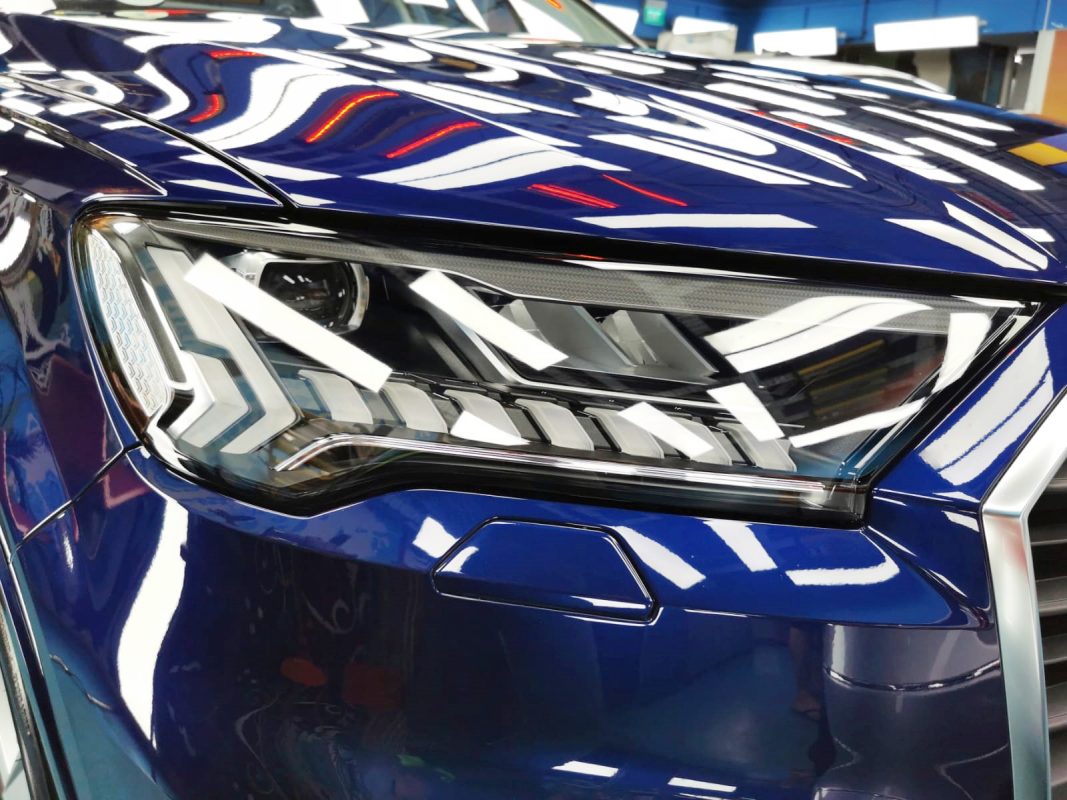 The Q7's coated paintwork showing clean reflections.