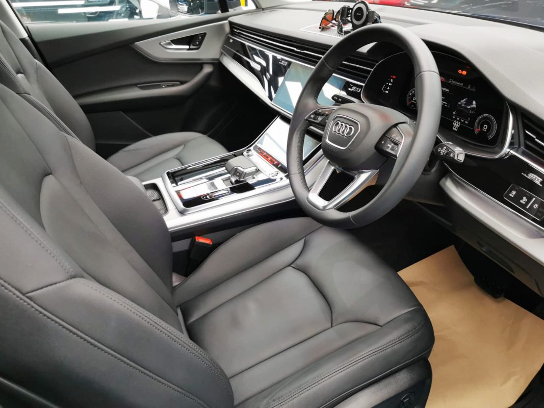 The Audi Q7 parked in the workshop, freshly coated.