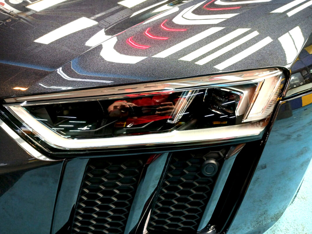The R8's coated paintwork showing clean reflections.