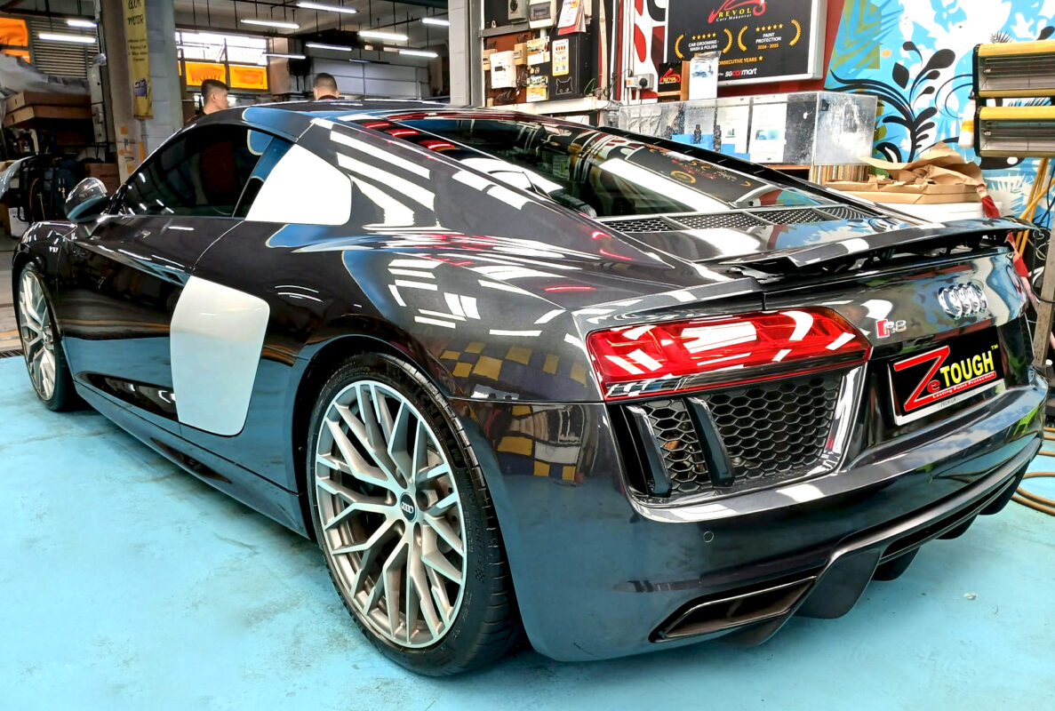 Rear quarter of the Audi R8, glossy and protected.