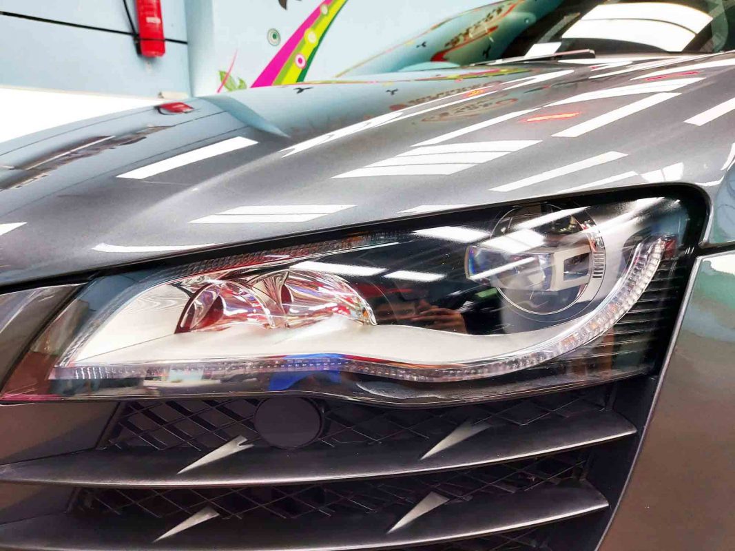 The R8's coated paintwork showing clean reflections.